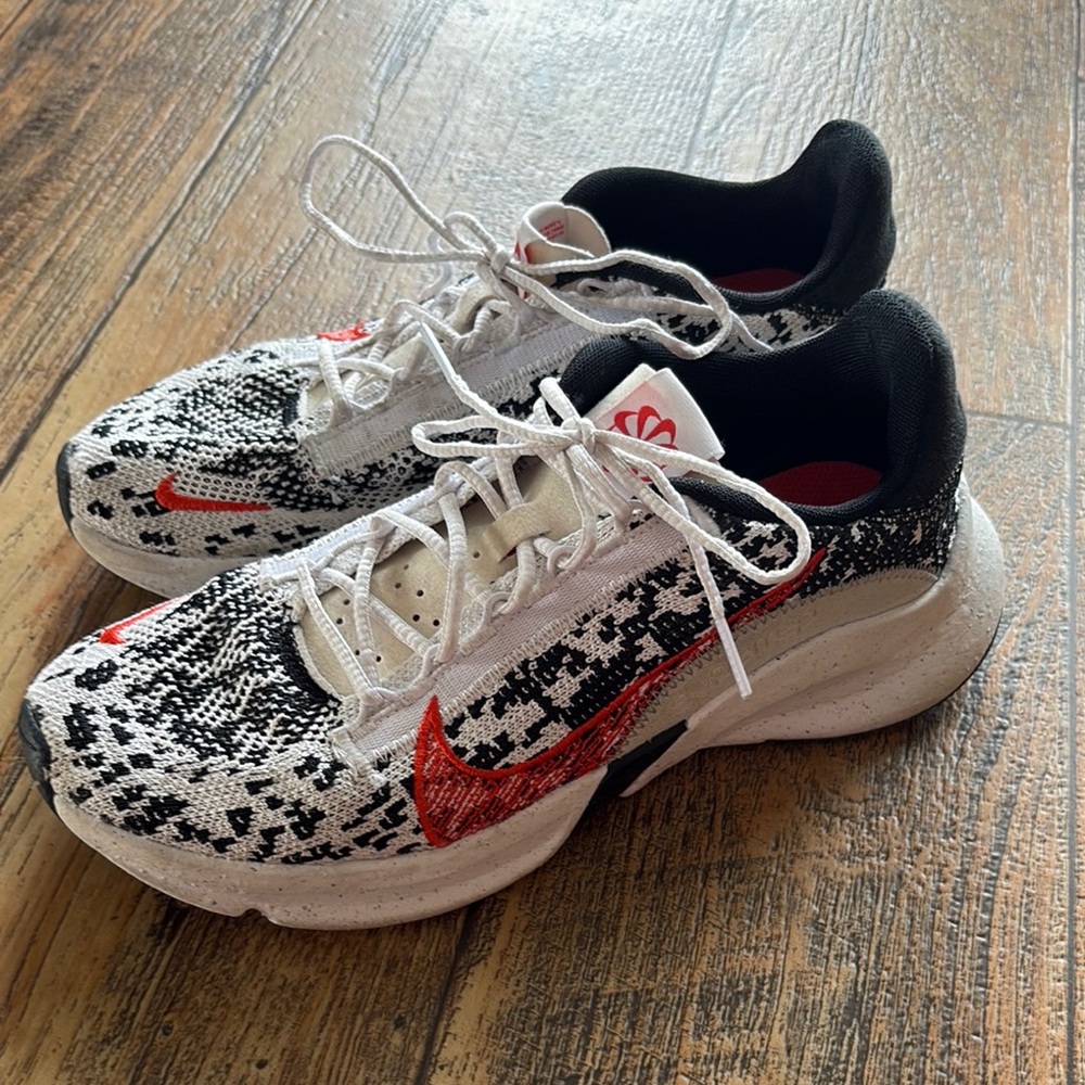 Nike Black and White Athletic Shoes with Urban Design